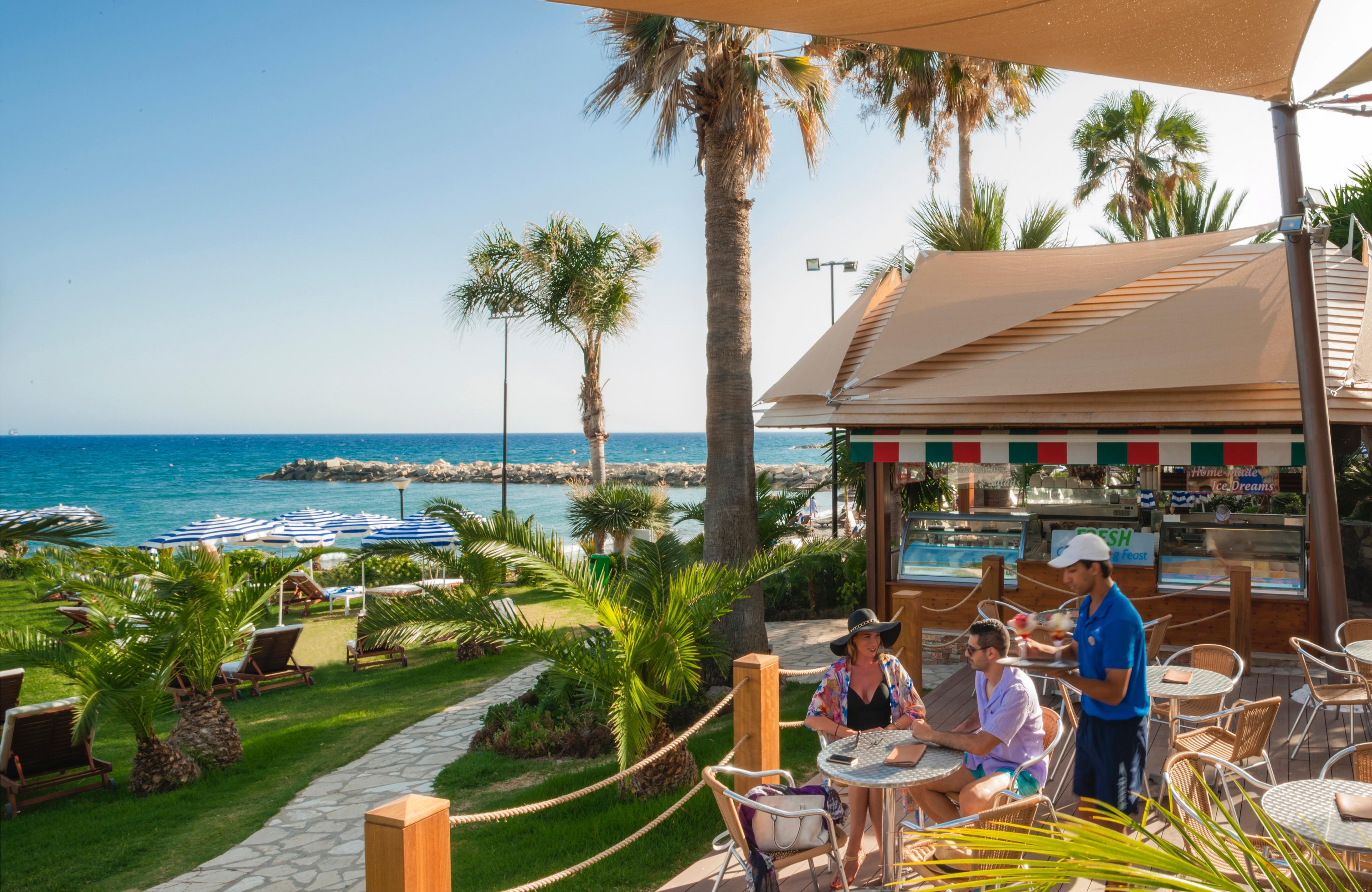 Amathus Beach Hotel Limassol Ngoại thất bức ảnh Tourists at a beach bar in Limassol, Cyprus